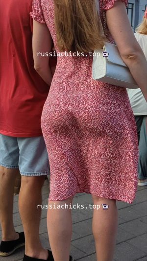 chick in dress and wind on street