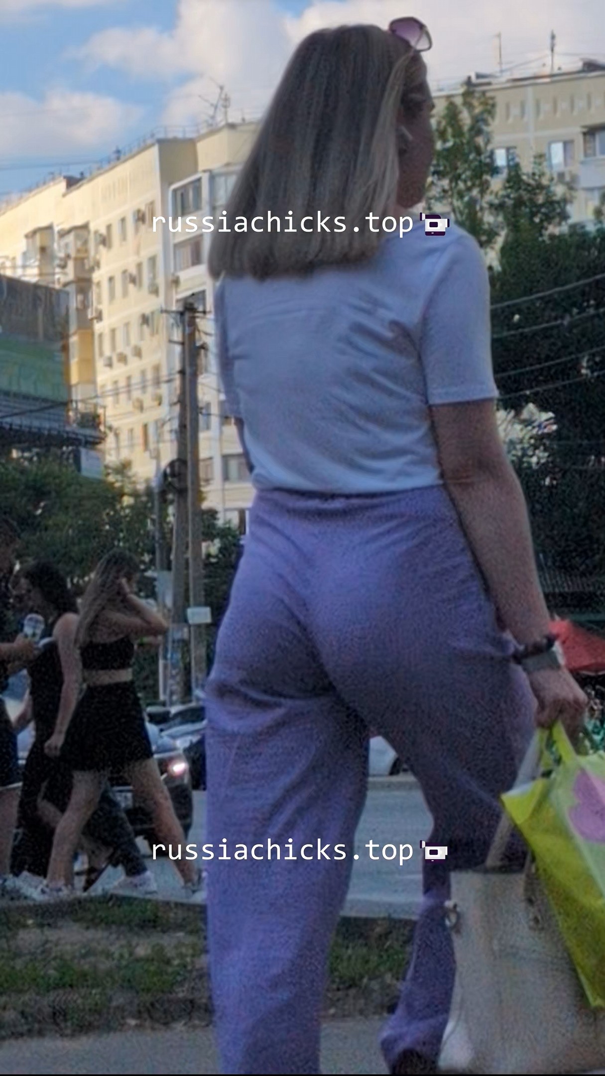 nice chicks in pants in dress on street