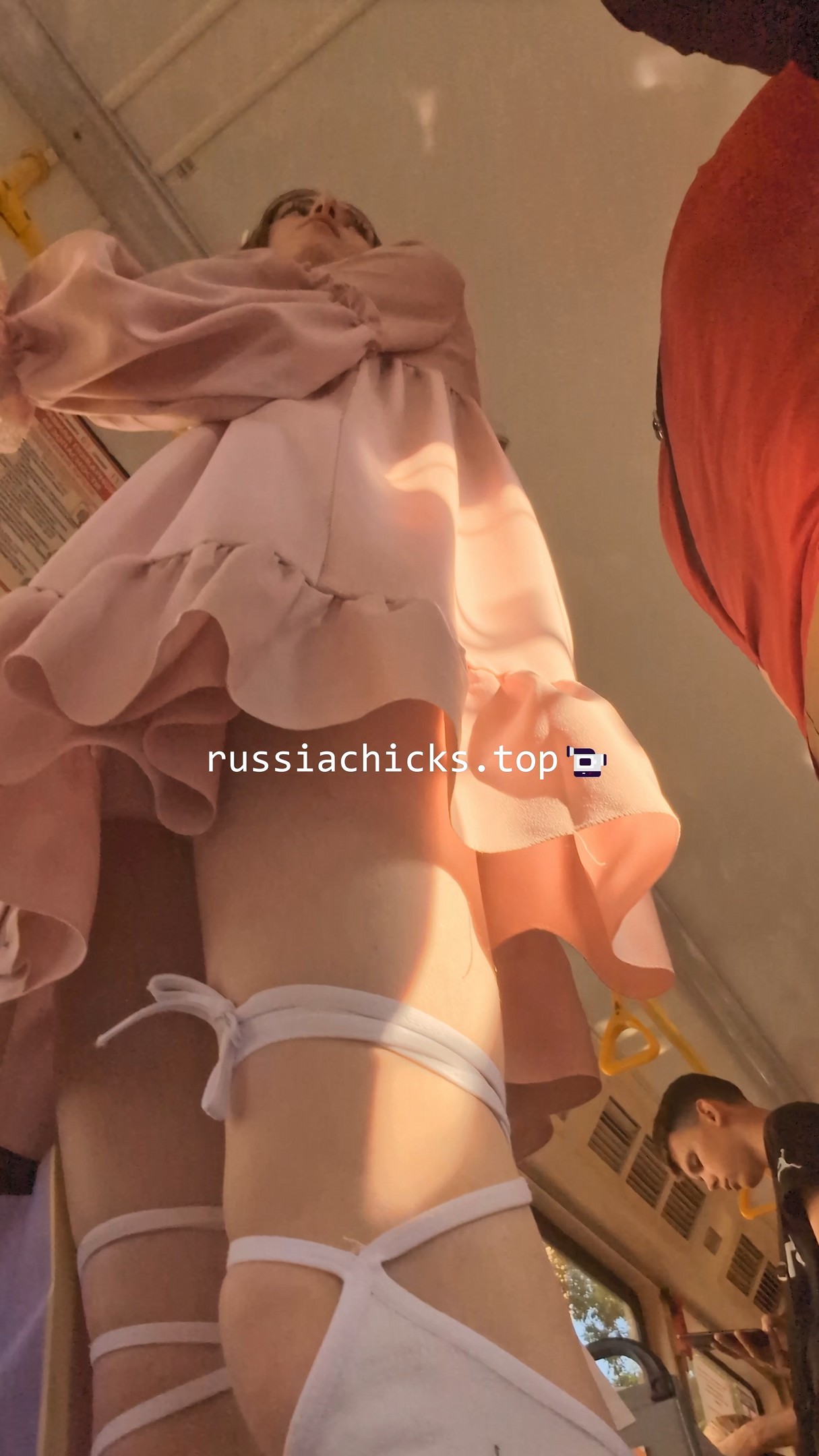 nice teen girl from tram in dress