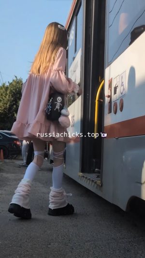 nice teen girl from tram in dress