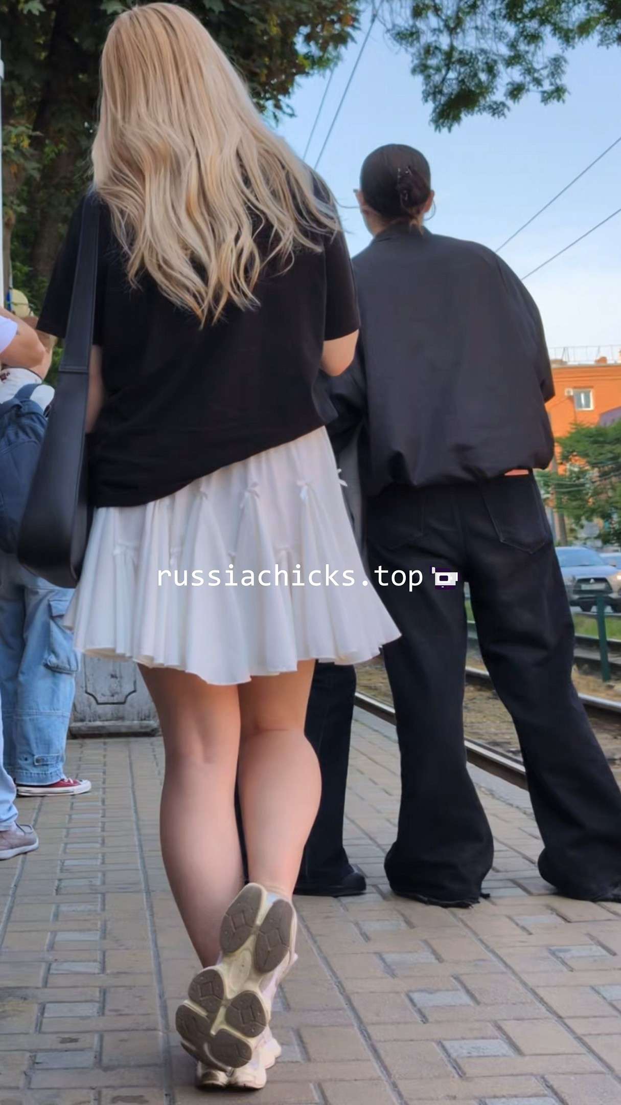 amazing blonde teen girl in skirt