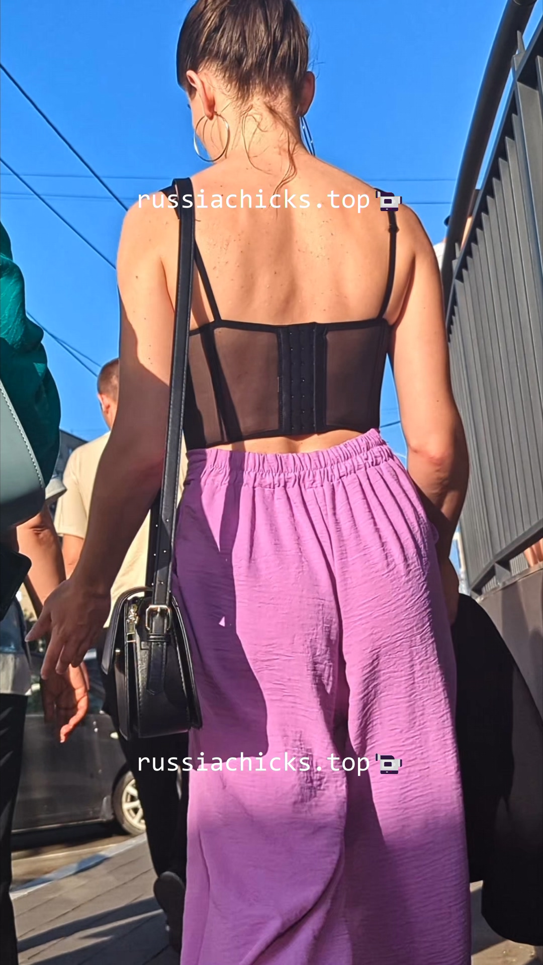 nice chick on street in pink pants