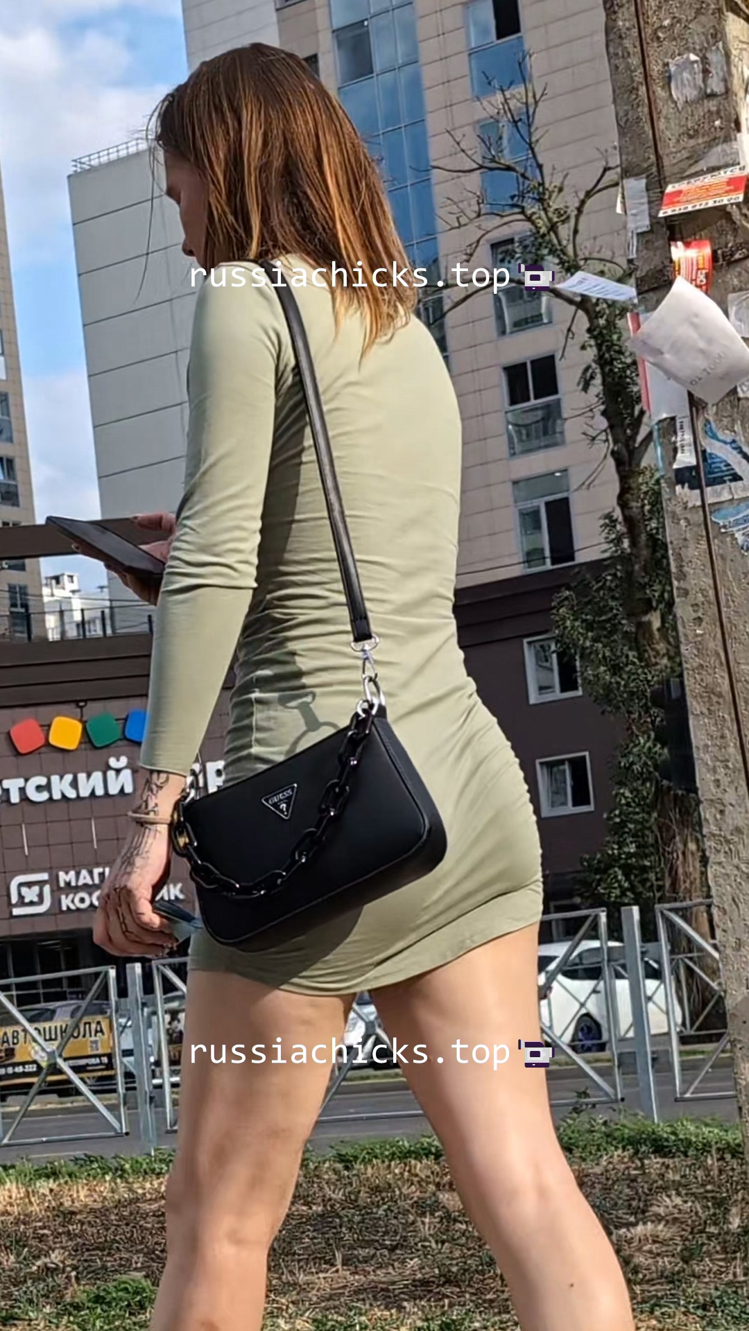nice girl in tight dress on street