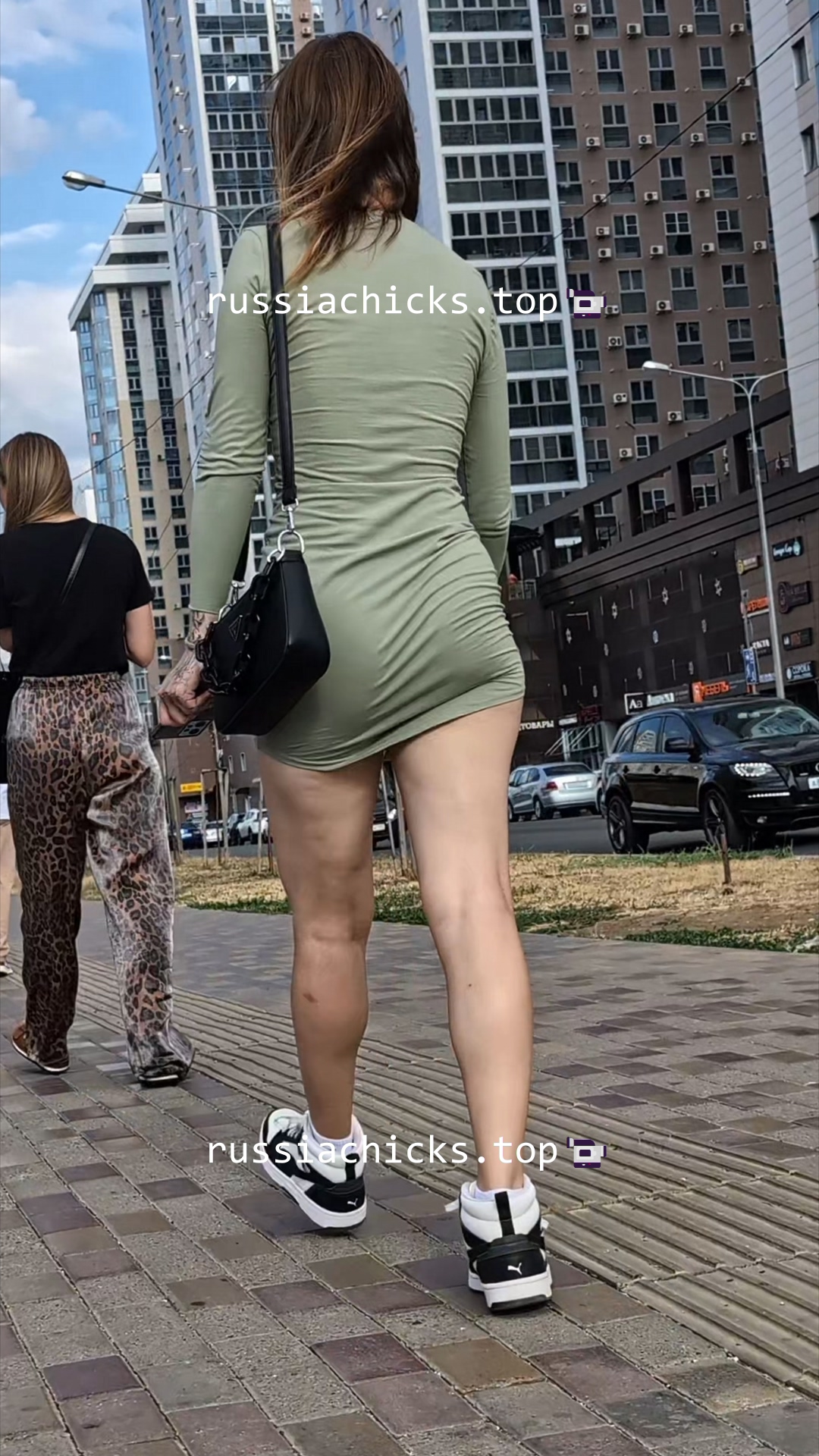 nice girl in tight dress on street